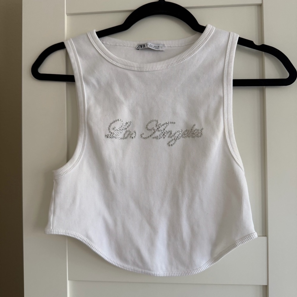 Zara White crop top with rhinestone "Los Angeles" detail. Size: L